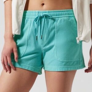 Athleta sz M Farallon turquoise cinch tie waist 4” inseam Cotton stretch shorts